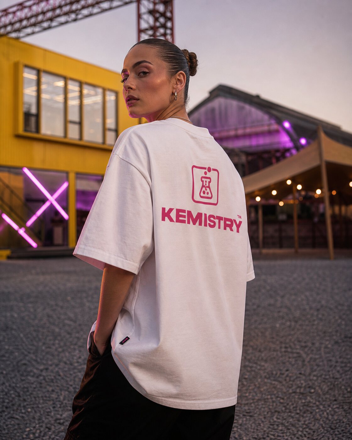 Model wearing the KEMISTRY x OFUR T-shirt at a Stadslab Groningen inspired venue